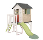 Maison de jeu enfant sur pilotis avec plateforme 70 cm échelle et toboggan matériau recyclé dès 2 ans modèle 7600810802