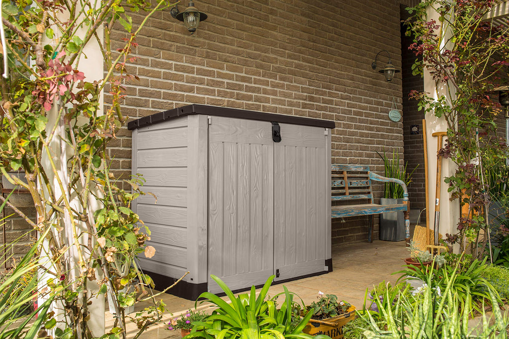 Abri poubelle extérieur 1200 litres en polypropylène imitation lattes de bois avec plancher porte verrouillable dimensions 145,5 x 82 x 123 cm