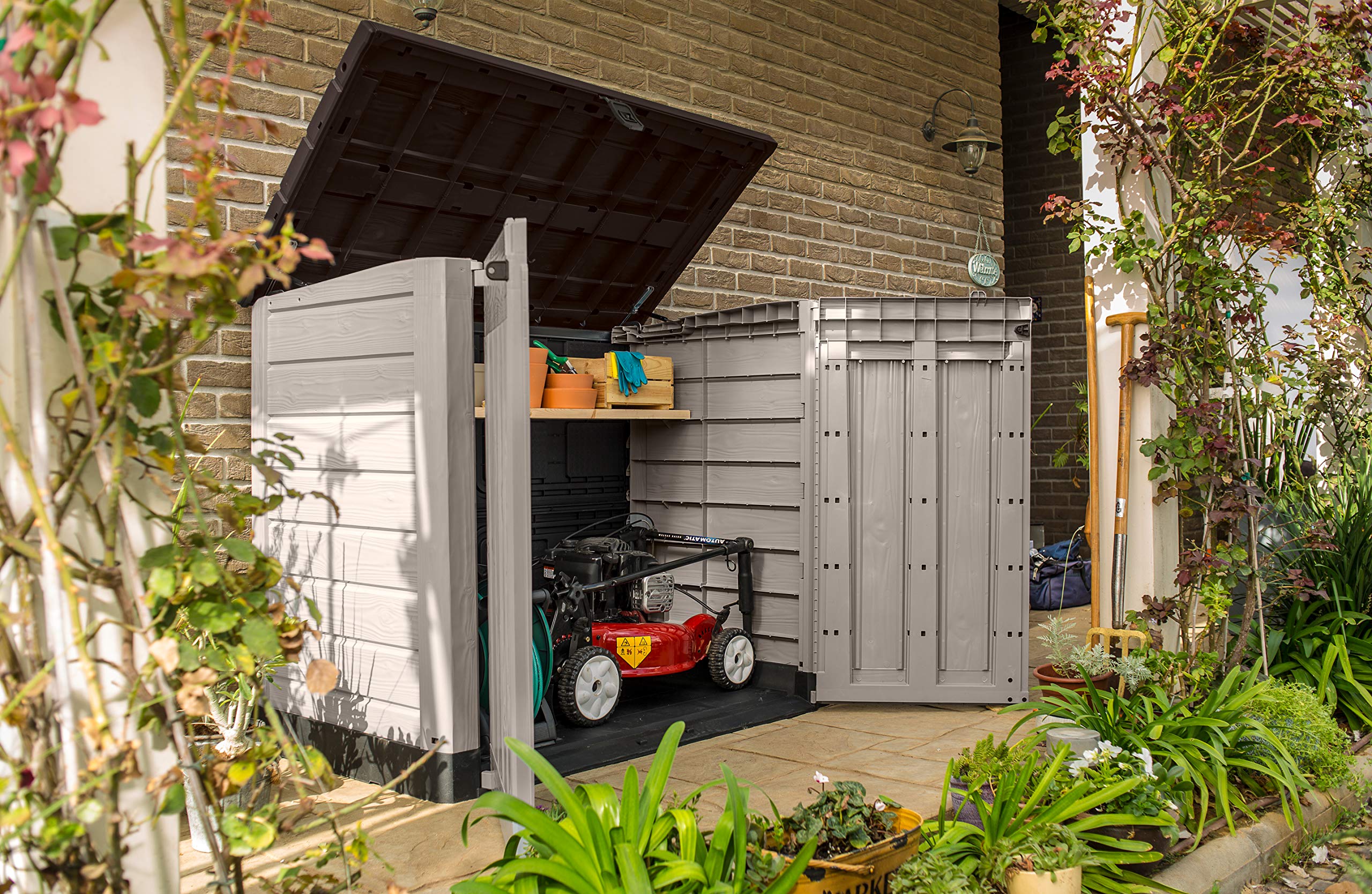 Abri poubelle extérieur 1200 litres en polypropylène imitation lattes de bois avec plancher porte verrouillable dimensions 145,5 x 82 x 123 cm
