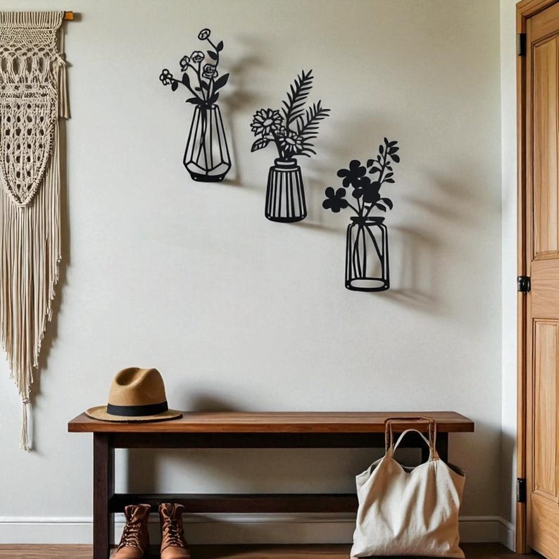 Décoration murale métal silhouette vase noir 37 cm