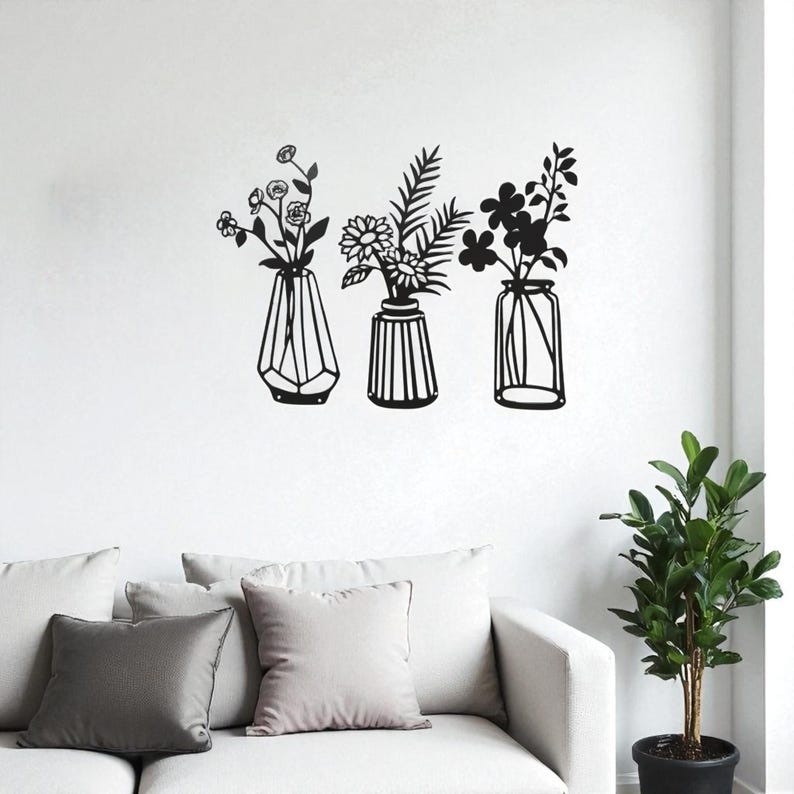 Décoration murale métal silhouette vase noir 37 cm